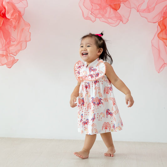 Zodiac Series - Baby Girl Jersey Dress in Red Carnival Horse Print by Le Petit Society