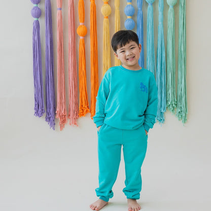 Zodiac Series - Kids Jogger Pants in Green by Le Petit Society — image 2