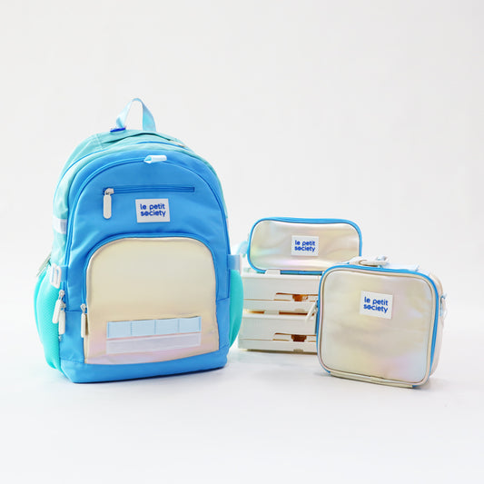 The LPS kids essential school bundle in blue and silver, consisting of a double pocket school bag, pencil case and mini lunch bag.