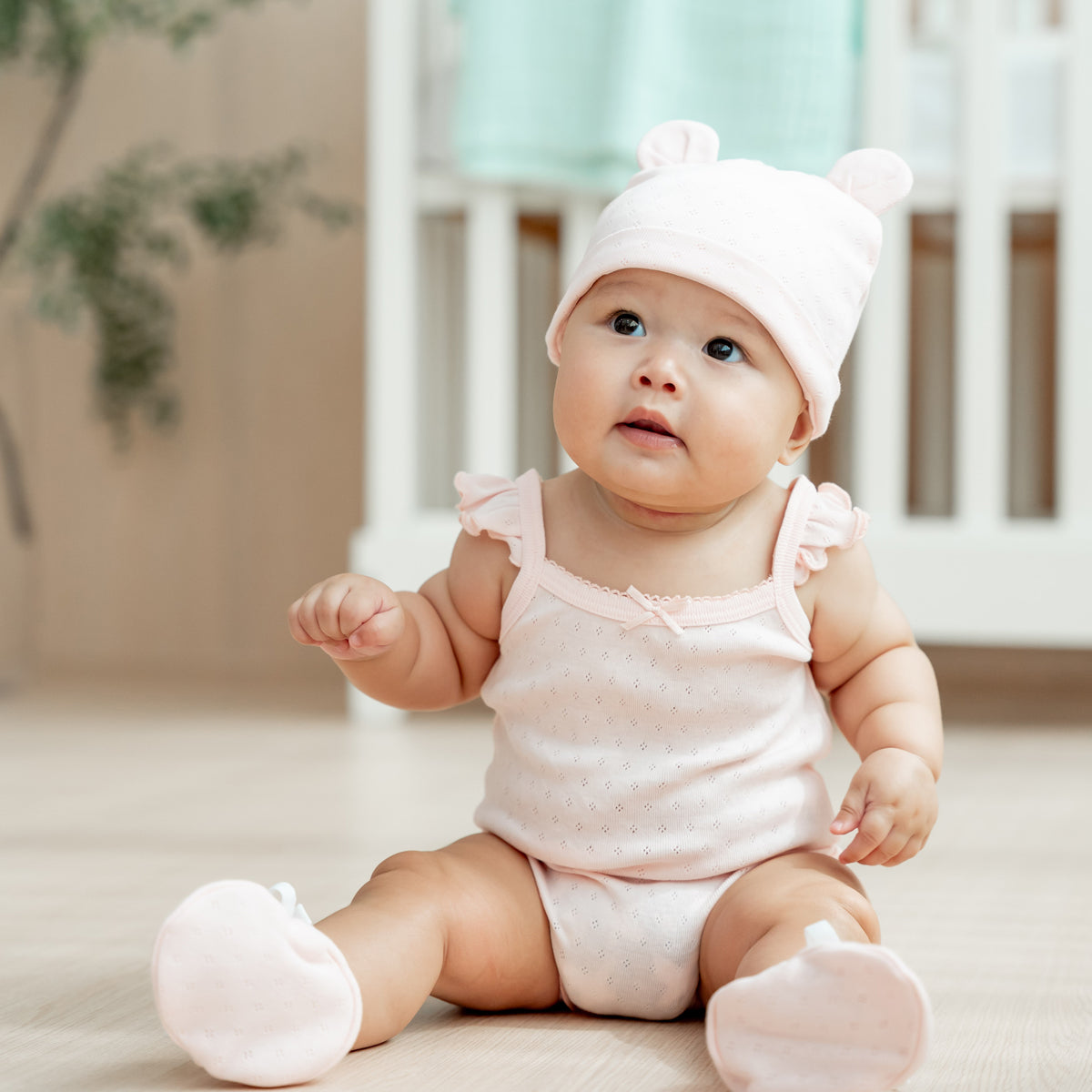 Organic Baby Ruffle Strap Romper in Pink by Le Petit Society