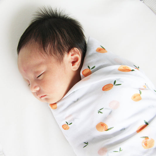Baby Organic Swaddle in Peach by Le Petit Society