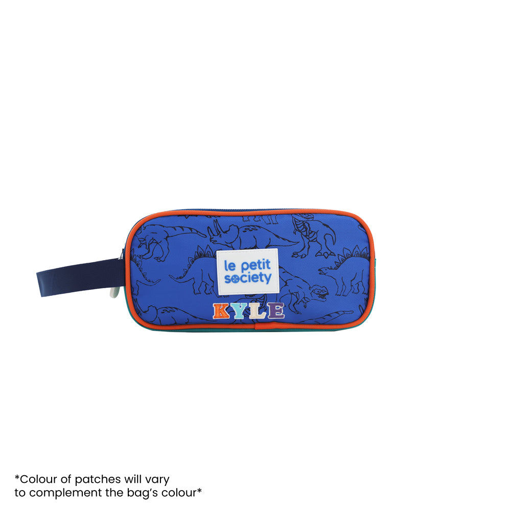 A blue and orange pencil in dinosaur print, and personalised with name patches.