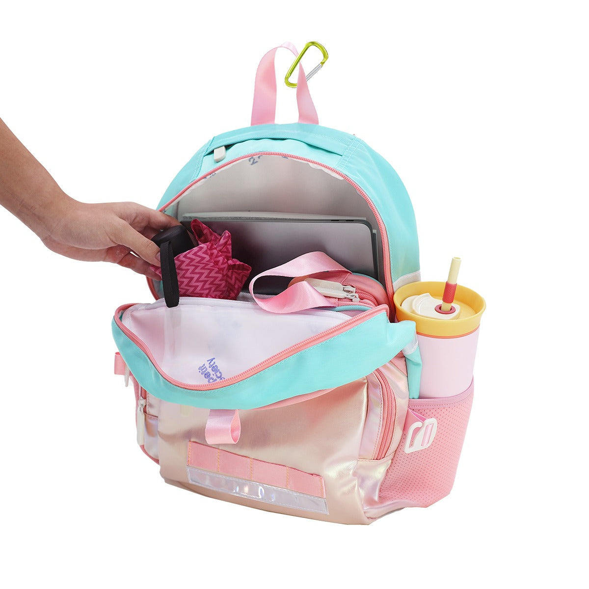 An umbrella, pencil case, laptop and notebooks being stored in the LPS kids single pocket school bag.