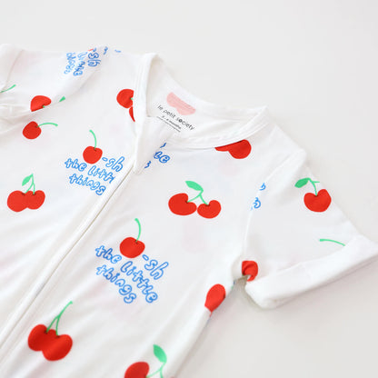 Baby Bamboo Short Sleeves Sleepsuit in Cherry Print by Le Petit Society — image 2