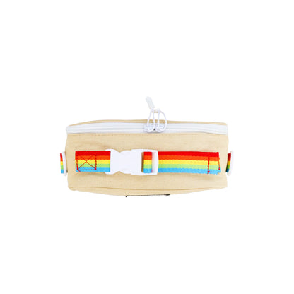 A beige-coloured thermal lunch bag with a rainbow print and rainbow bag strap.
