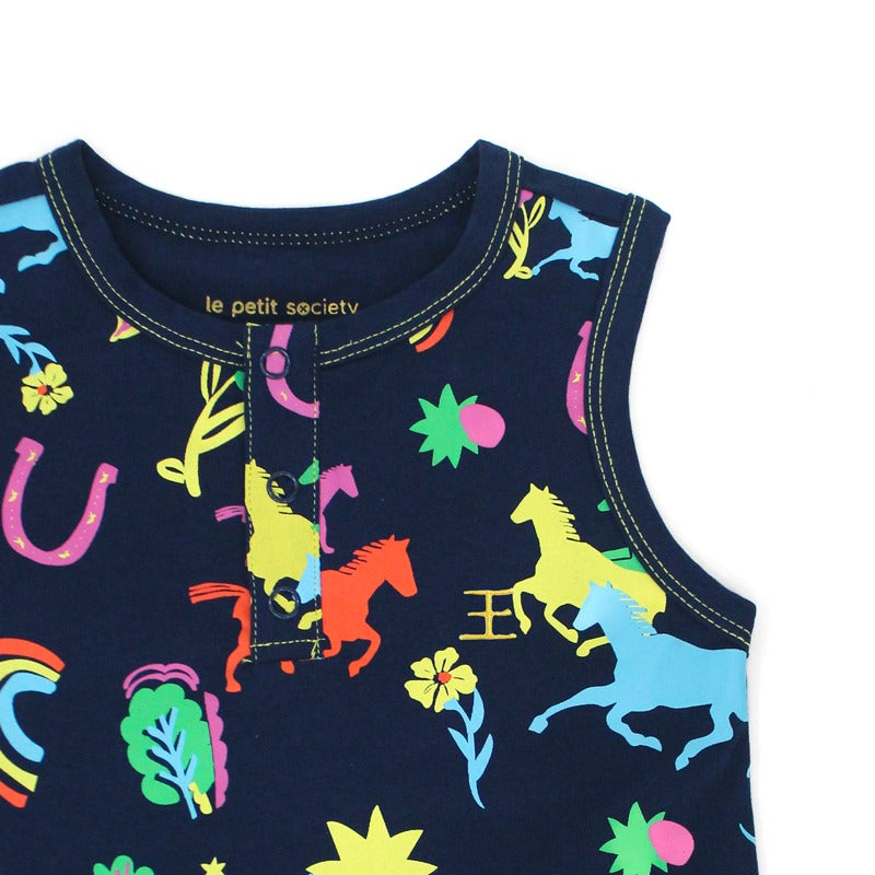 Le Petit Society x Sheila Sim CNY 2026 Rainbow Horse Collection — Close-up view of the sleeveless navy baby romper featuring bright rainbow horses, lucky charms and contrasting yellow stitching around the neckline and button placket.