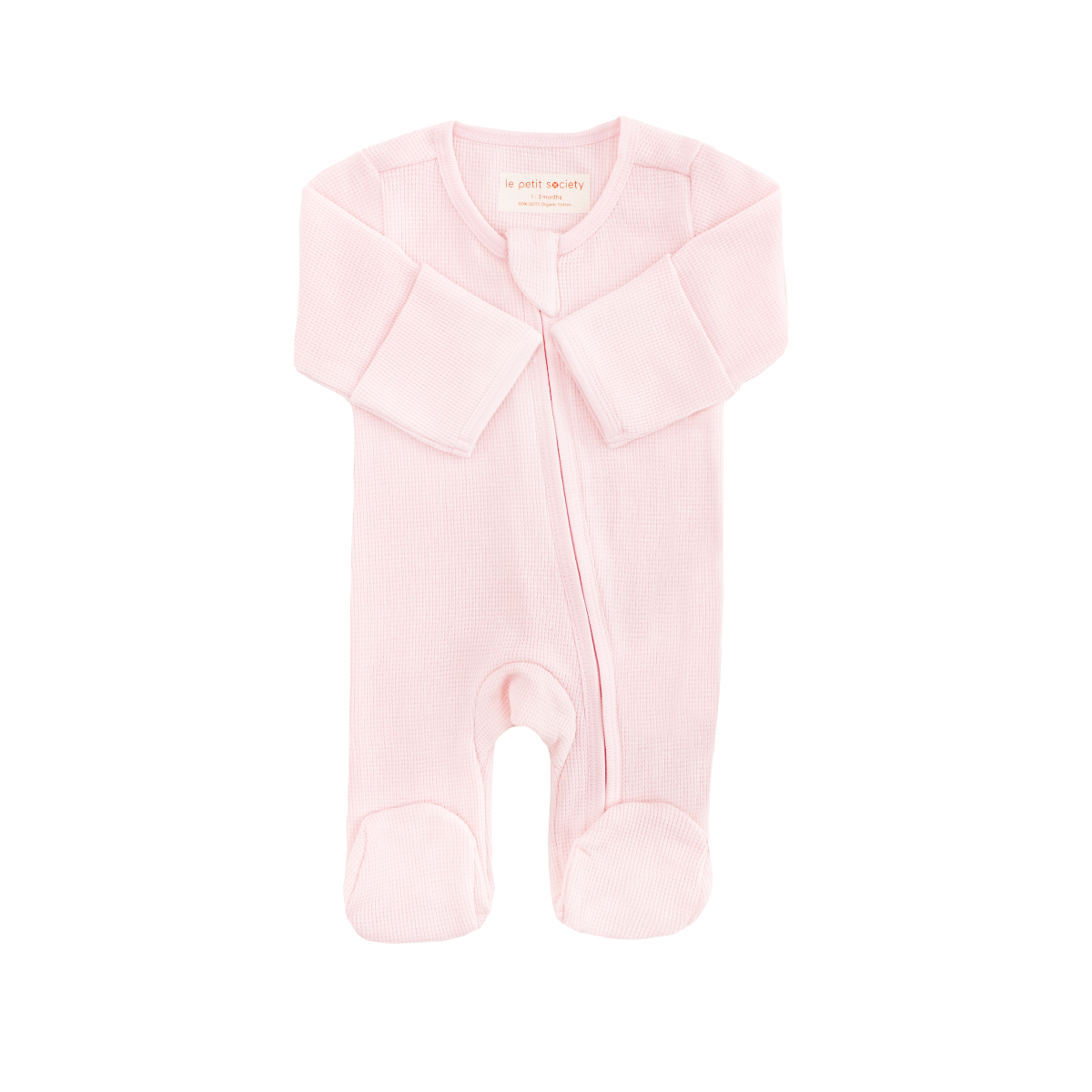 An organic baby zip sleepsuit in pink by Le Petit Society.