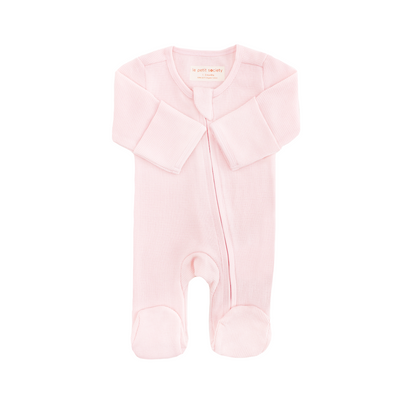 An organic baby zip sleepsuit in pink by Le Petit Society.