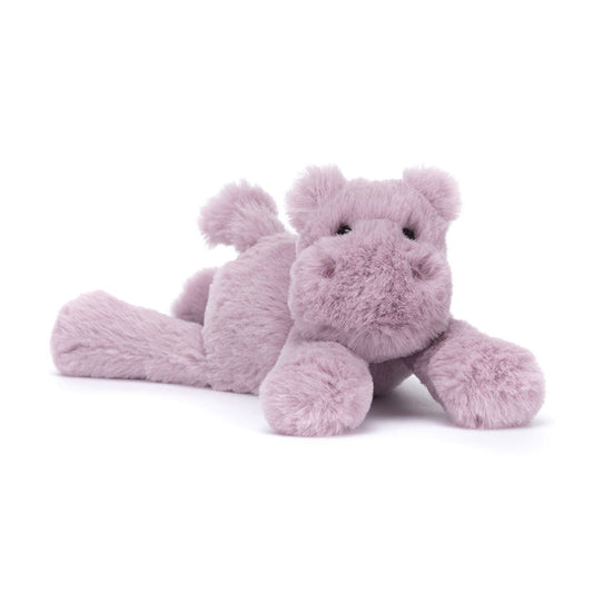 A 45 degree view of an adorable tiny plush hippo toy in soft pastel purple with a fluffy texture, round snout, and cuddly limbs.