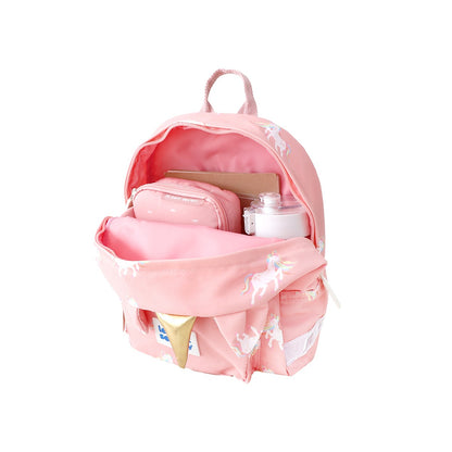 A water bottle, pencil case and notebook stored in a pink, unicorn print preschool bag.