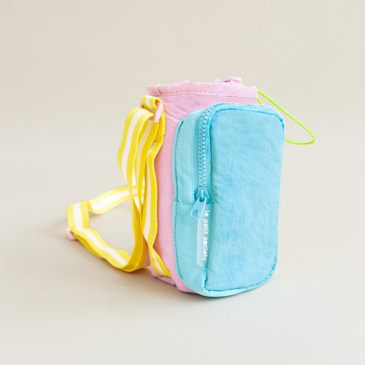 Tricoloured water bottle sling bag with an adjustable strap and a front pocket.