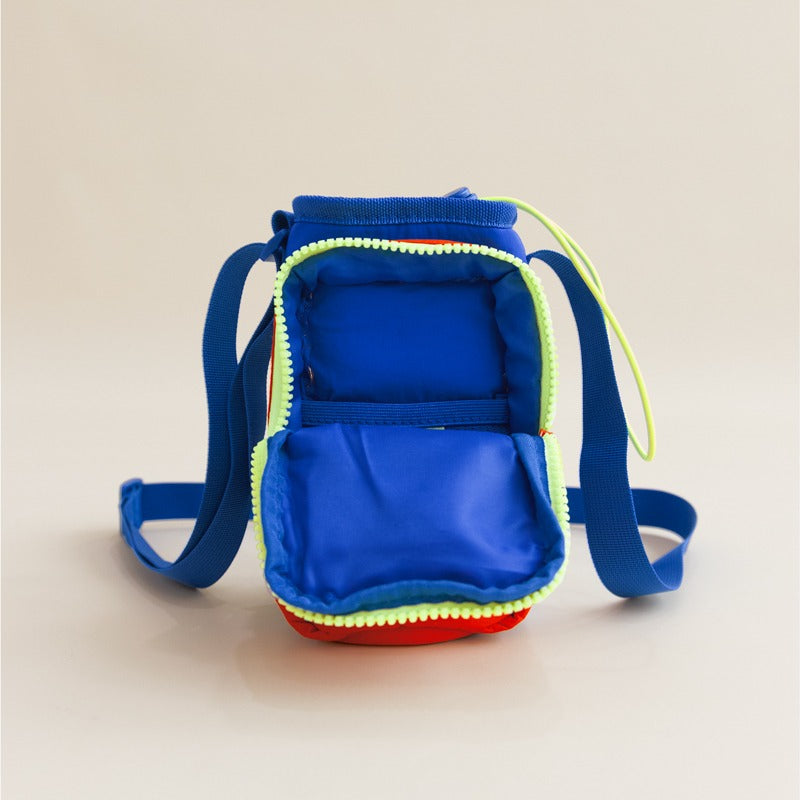 An inner view of the front pocket of a water bottle bag 