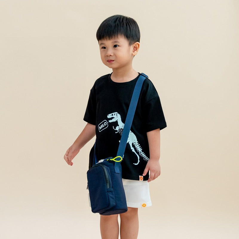 Little boy carrying a marine blue water bottle sling bag