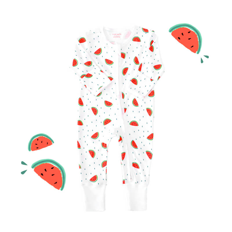 An organic baby zip sleepsuit from Le Petit Society. It is white in colour, with a print of red and green watermelons and foldable mittens and footies.