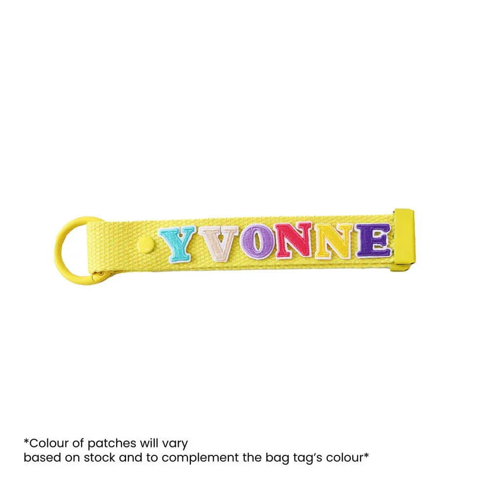 Le Petit Society's customisable bag tag with name patches.