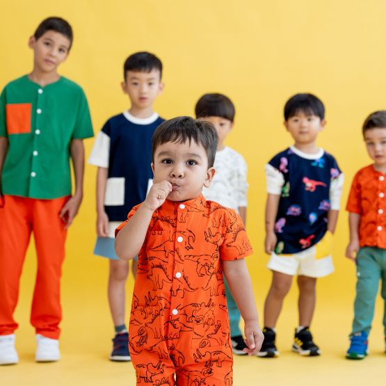 Made for Play - Kids Playsuit in Dino Sketch Print in Orange