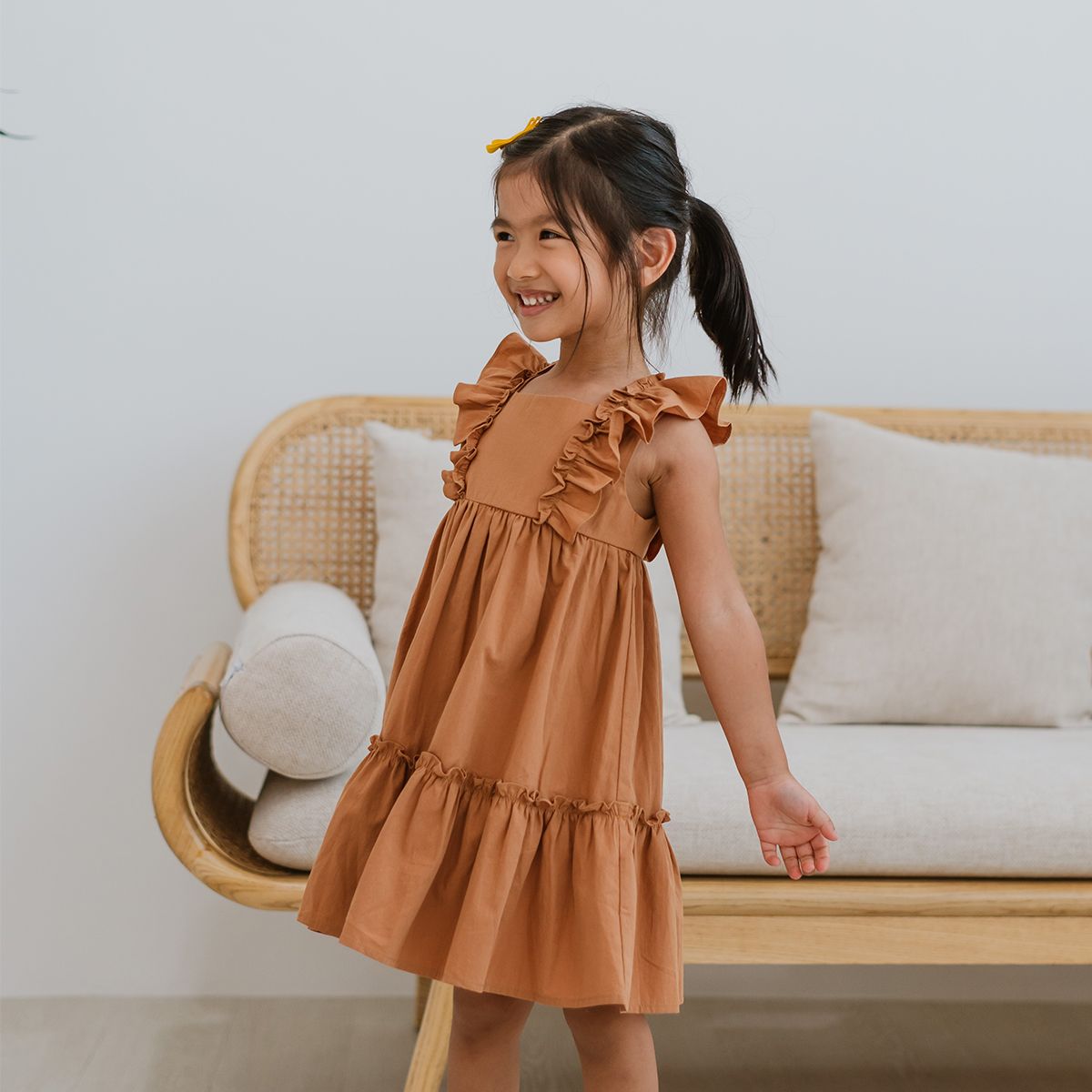 Girls Ruffled Baby Doll Dress in Caramel